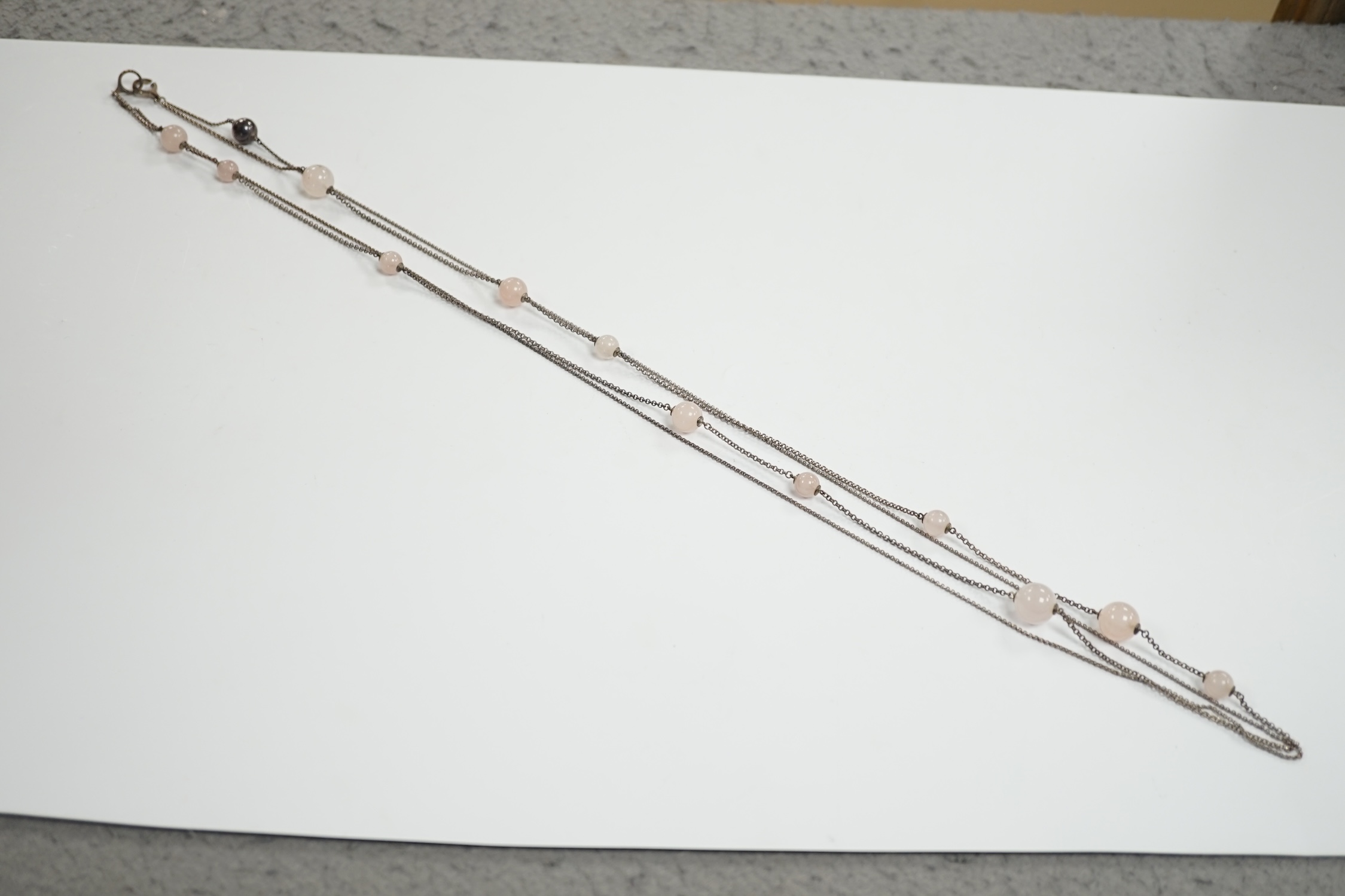 A modern Georg Jensen twin strand silver and rose quartz twelve stone rose quartz sphere set necklace, 98cm, with Georg Jensen box.